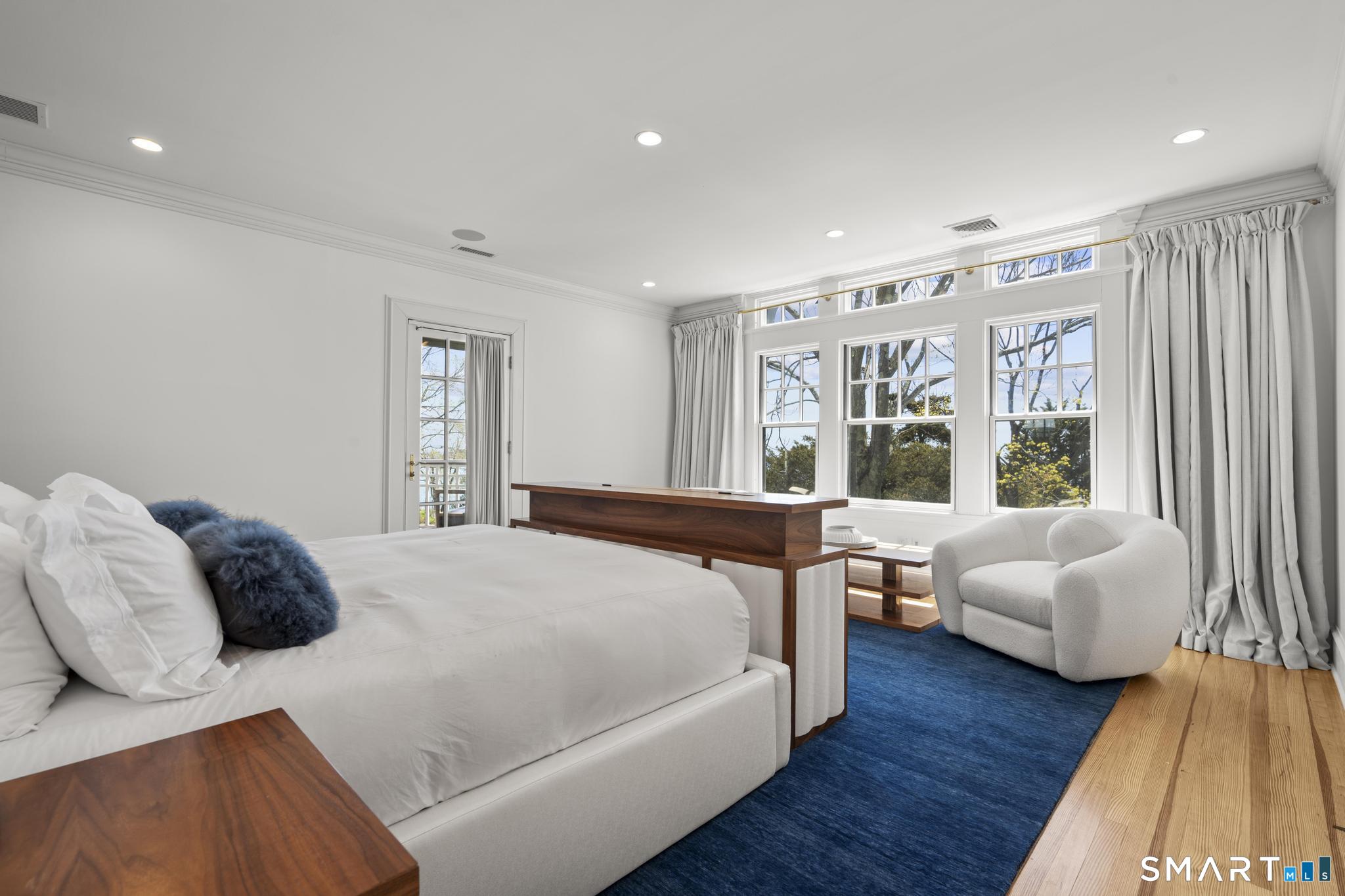 0 Rogers Island Branford, CT 06405 - Photo 15 of 40 a bedroom with a bed and a couch
