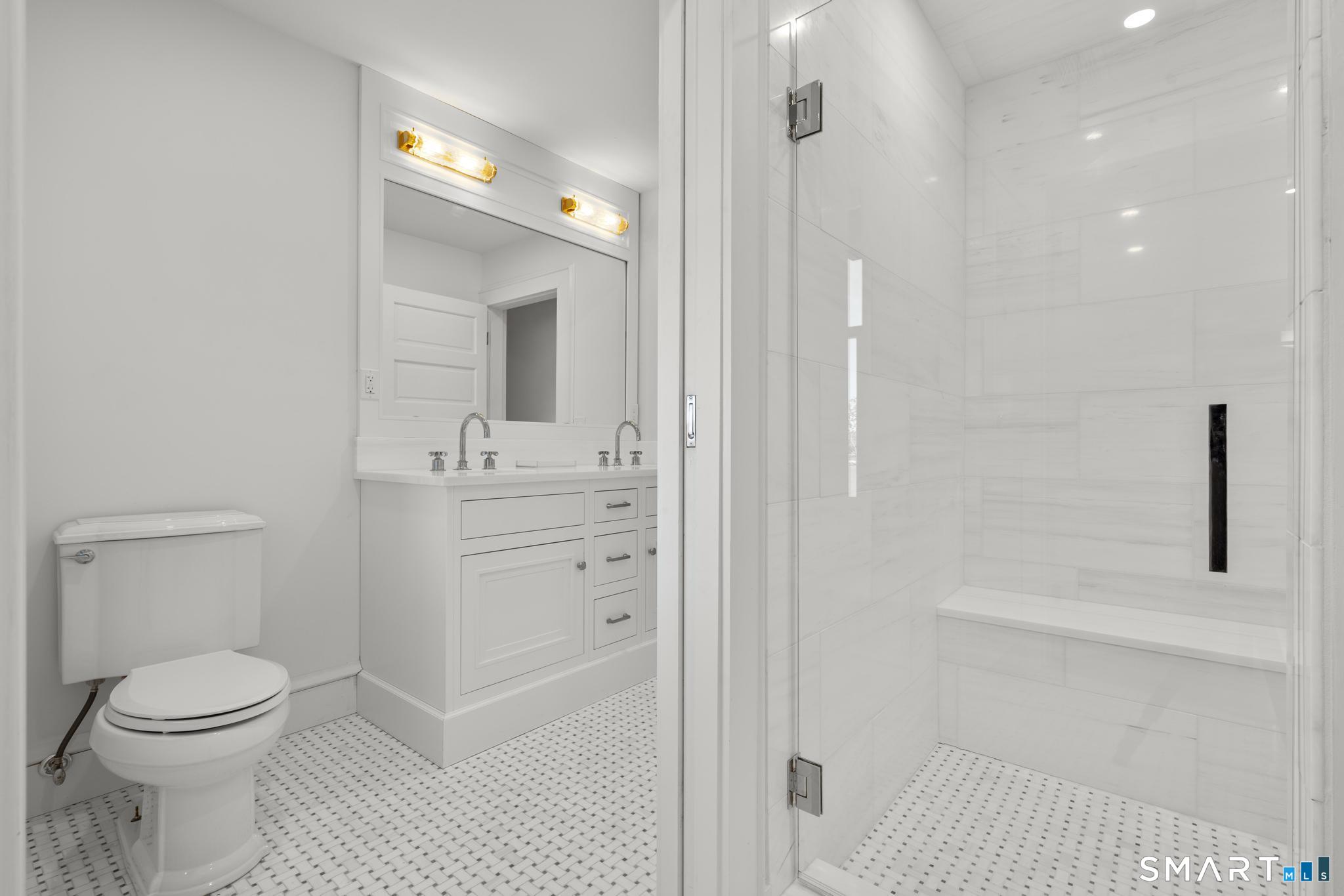 0 Rogers Island Branford, CT 06405 - Photo 20 of 40 a bathroom with a sink a toilet and shower
