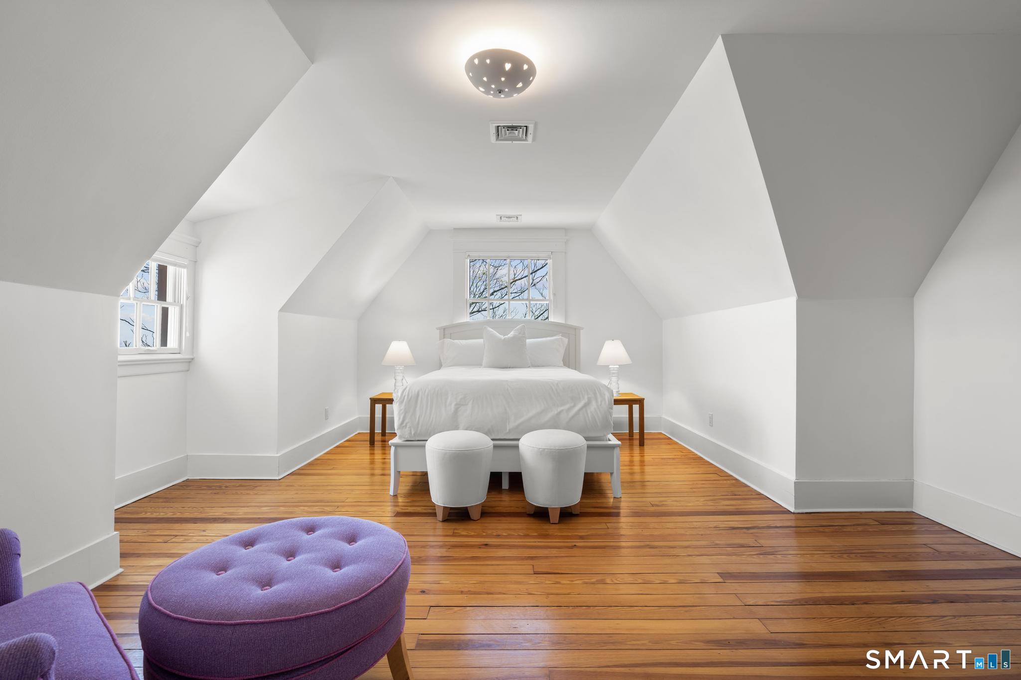 0 Rogers Island Branford, CT 06405 - Photo 24 of 40 a living room with furniture and a wooden floor
