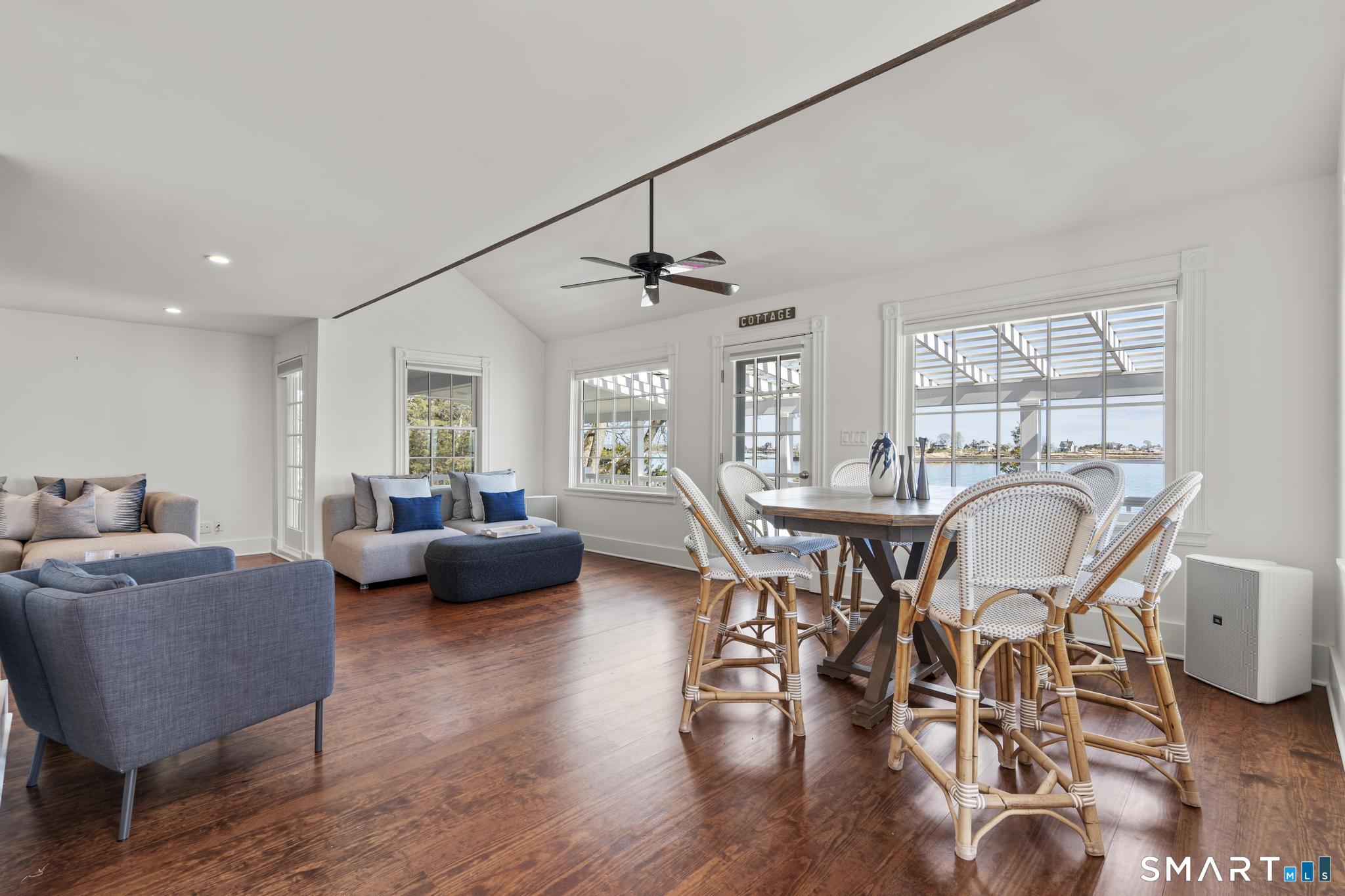 0 Rogers Island Branford, CT 06405 - Photo 28 of 40 a view of a dining room with furniture and wooden floor