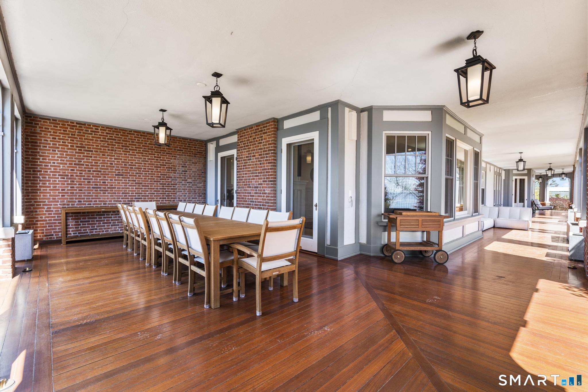 0 Rogers Island Branford, CT 06405 - Photo 4 of 40 a view of a dining room with furniture and wooden floor