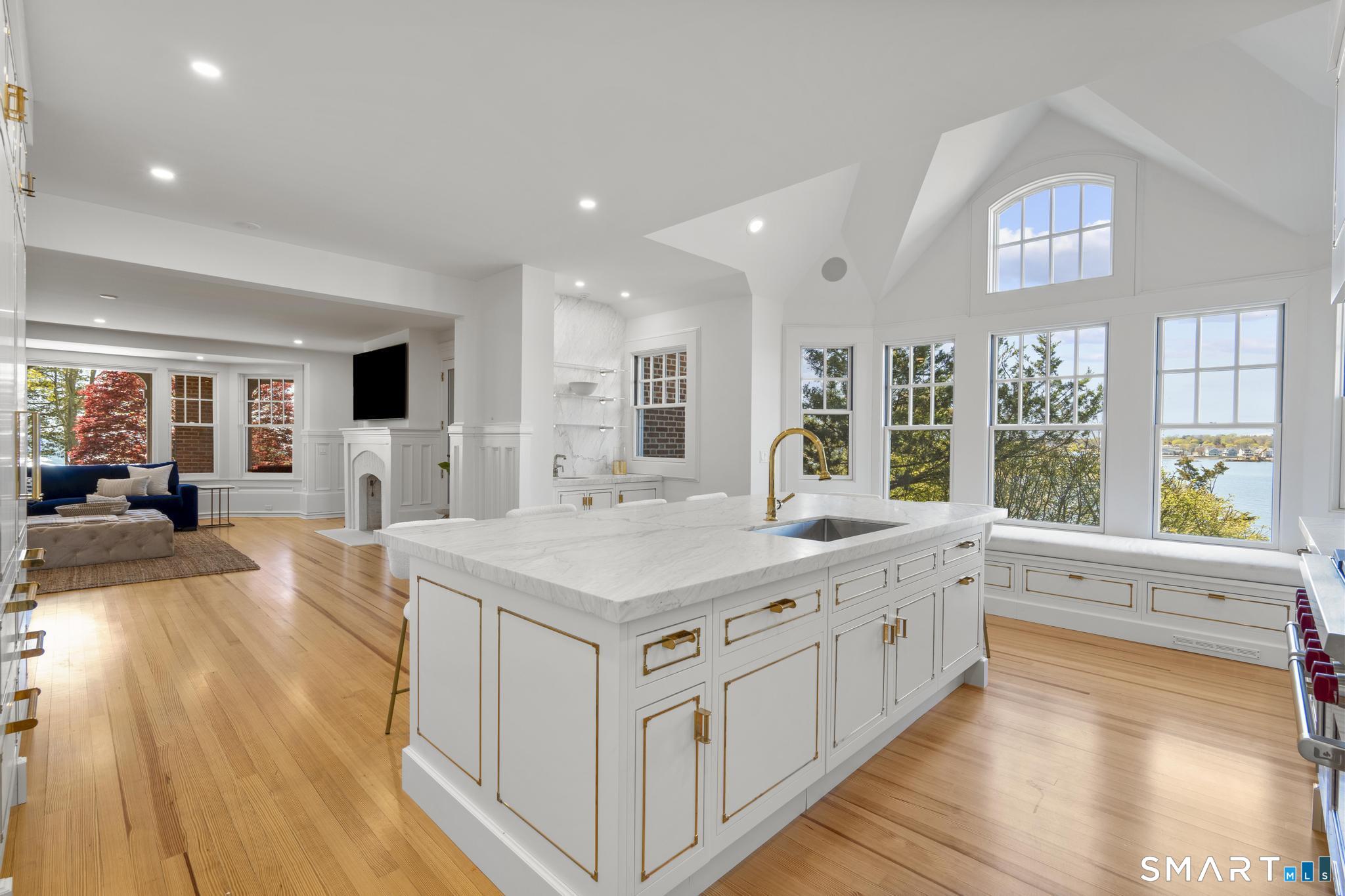 0 Rogers Island Branford, CT 06405 - Photo 10 of 40 a large white kitchen with a large window