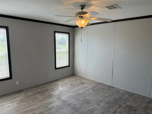 a bathroom with a tub and shower