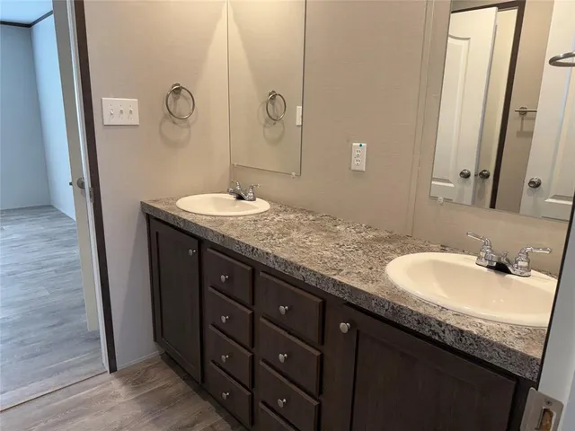a bathroom with a toilet and a sink