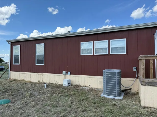 a view of a chairs in a patio