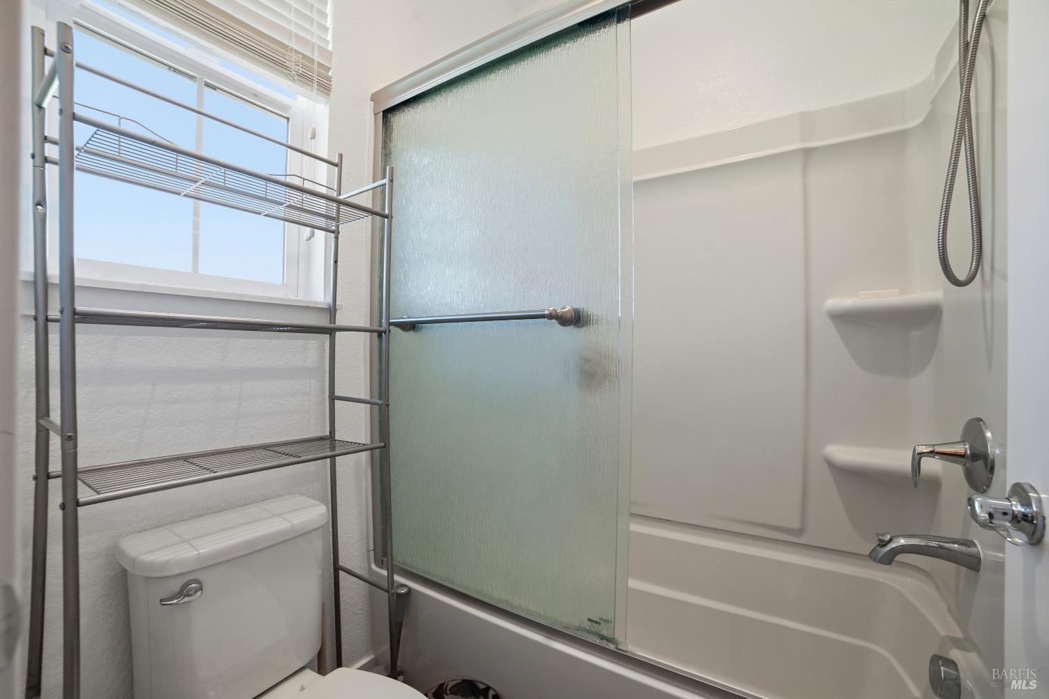 5305 Kirby Place Rohnert Park, CA 94928 - Photo 21 of 37 a bathroom with a shower and a toilet
