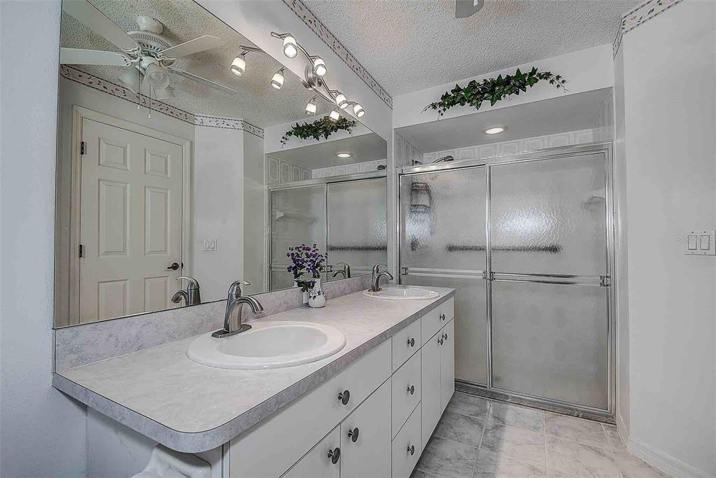 1020 Trafalgar Drive New Port Richey, FL 34655 - Photo 17 of 41 a bathroom with a sink double vanity and a mirror