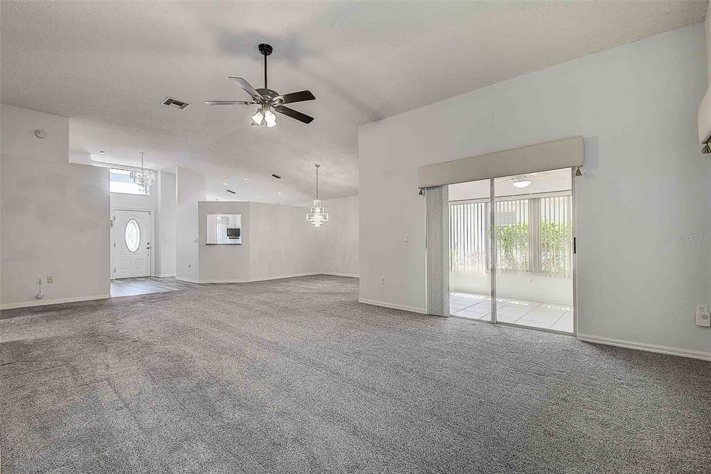 1020 Trafalgar Drive New Port Richey, FL 34655 - Photo 18 of 41 a view of an empty room with a window