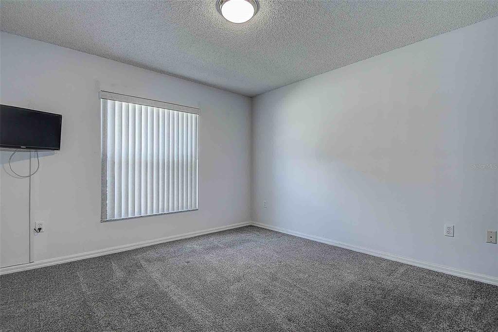 1020 Trafalgar Drive New Port Richey, FL 34655 - Photo 19 of 41 a view of an empty room with a window