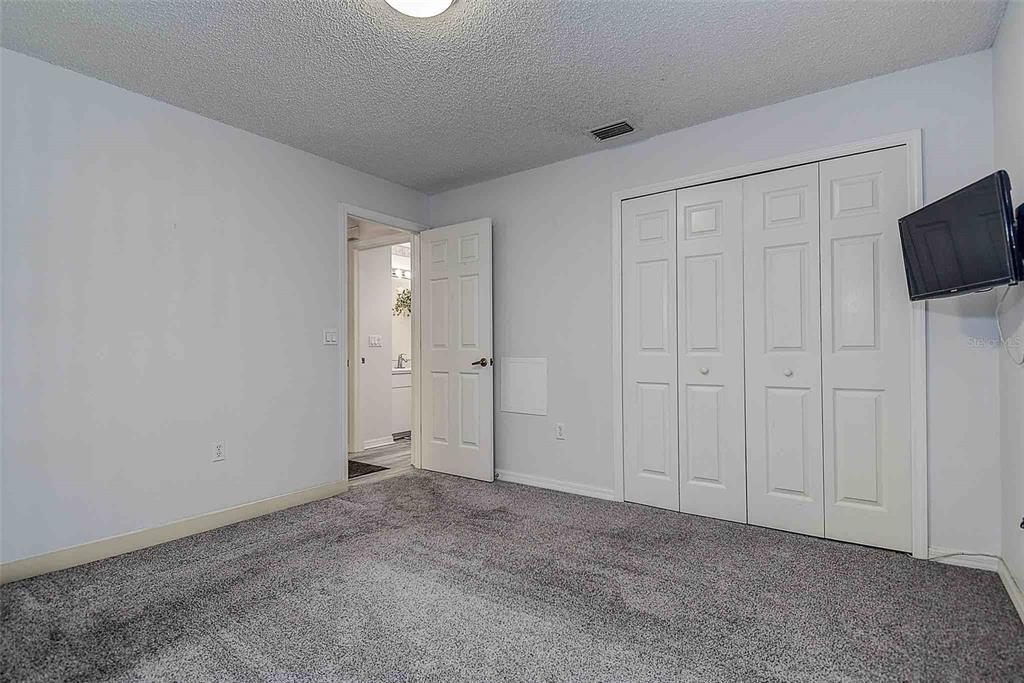 1020 Trafalgar Drive New Port Richey, FL 34655 - Photo 20 of 41 a view of a livingroom with an empty space and a window