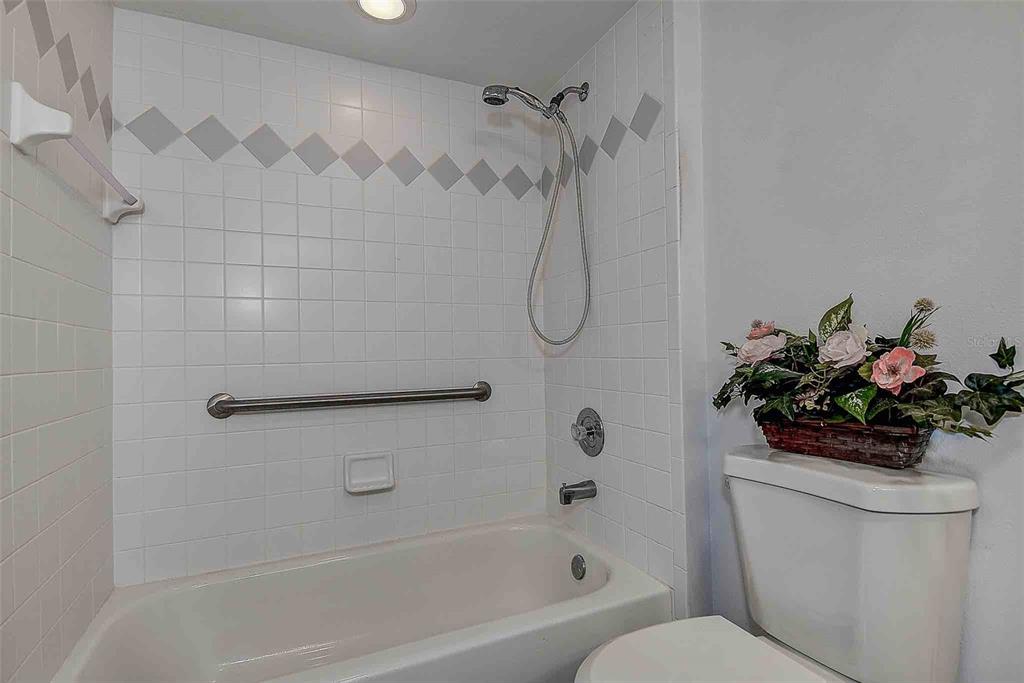 1020 Trafalgar Drive New Port Richey, FL 34655 - Photo 22 of 41 a bath room with a toilet and a shower