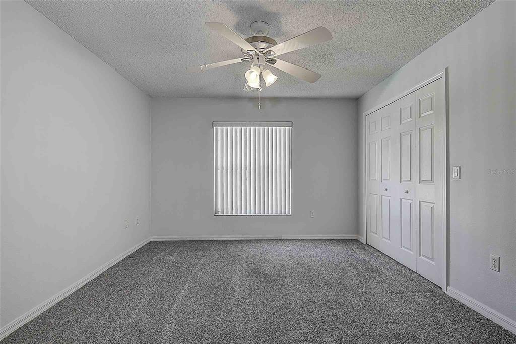 1020 Trafalgar Drive New Port Richey, FL 34655 - Photo 23 of 41 a view of an empty room with a window