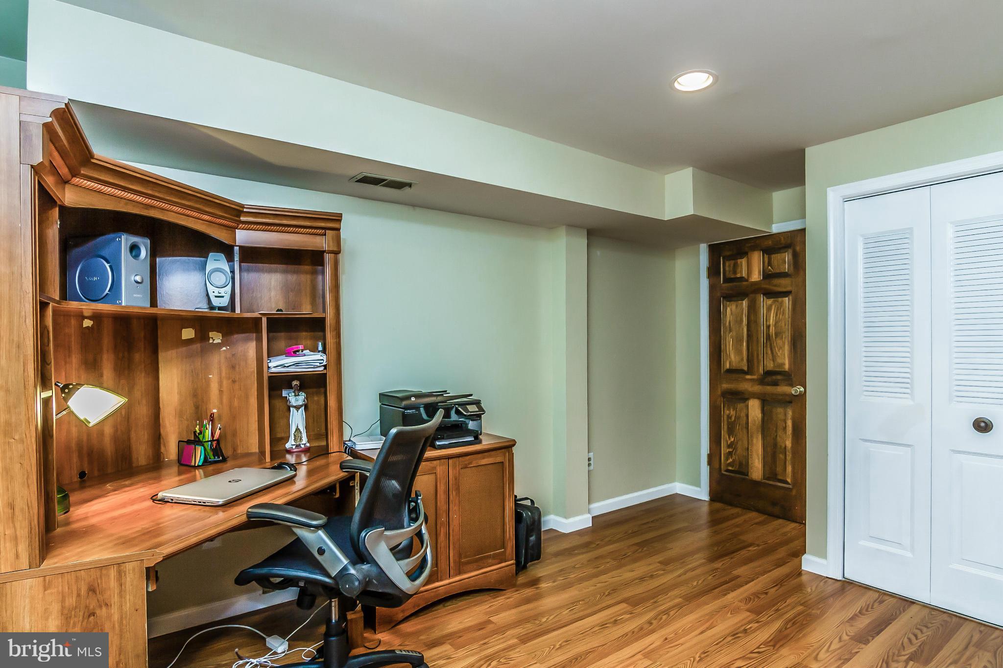 131 Summit Hall Road Gaithersburg, MD 20877 - Photo 22 of 30 a view of a room with gym equipment