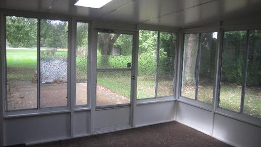 24760 Chestnut Lane Crete, IL 60417 - Photo 5 of 10 a view of an empty room with wooden floor and a window