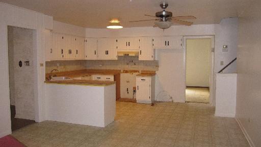 24760 Chestnut Lane Crete, IL 60417 - Photo 6 of 10 a kitchen with cabinets and window