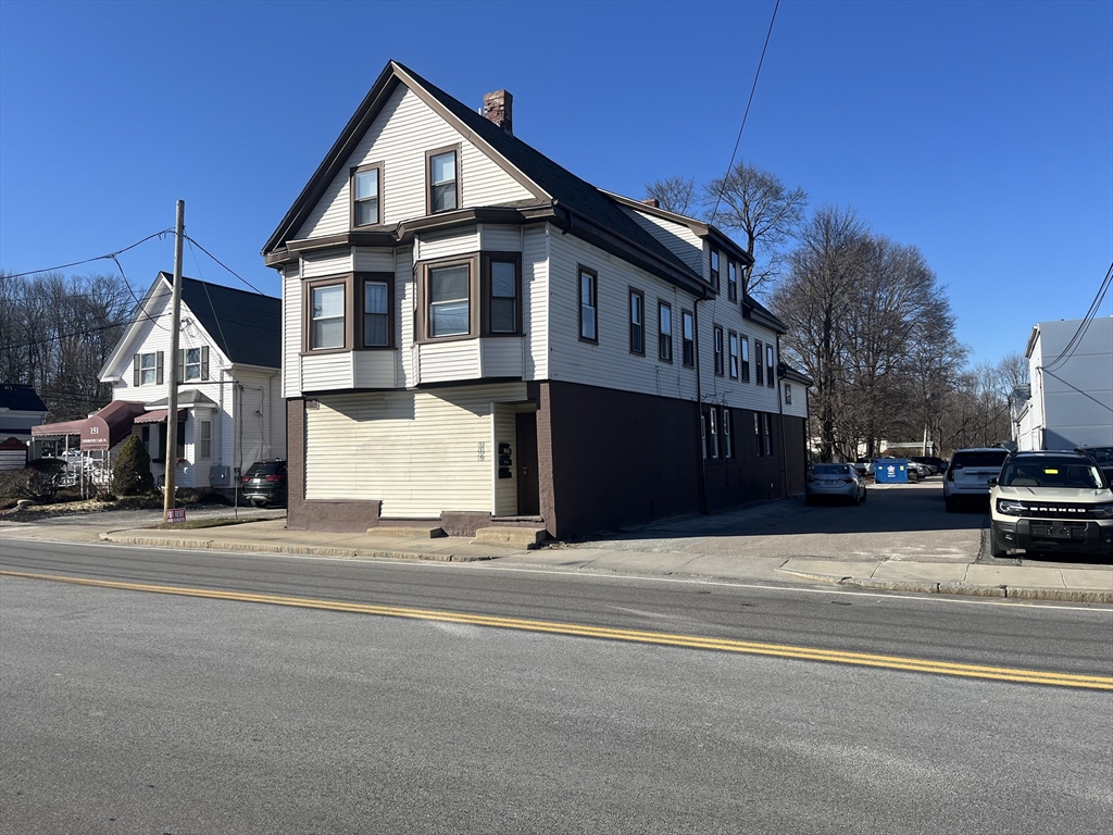 159 East Central Street, Unit 2 Franklin, MA 02038 - Photo 1 of 28 a view of a house with a street