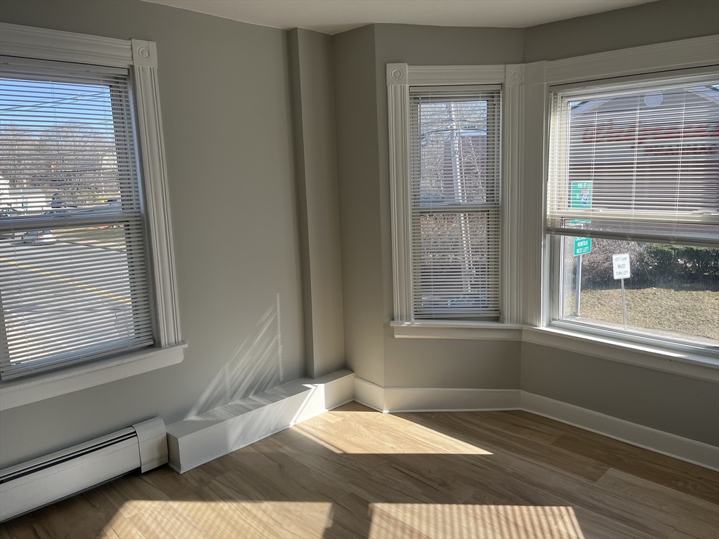 159 East Central Street, Unit 2 Franklin, MA 02038 - Photo 14 of 28 a bedroom with a bed and a window