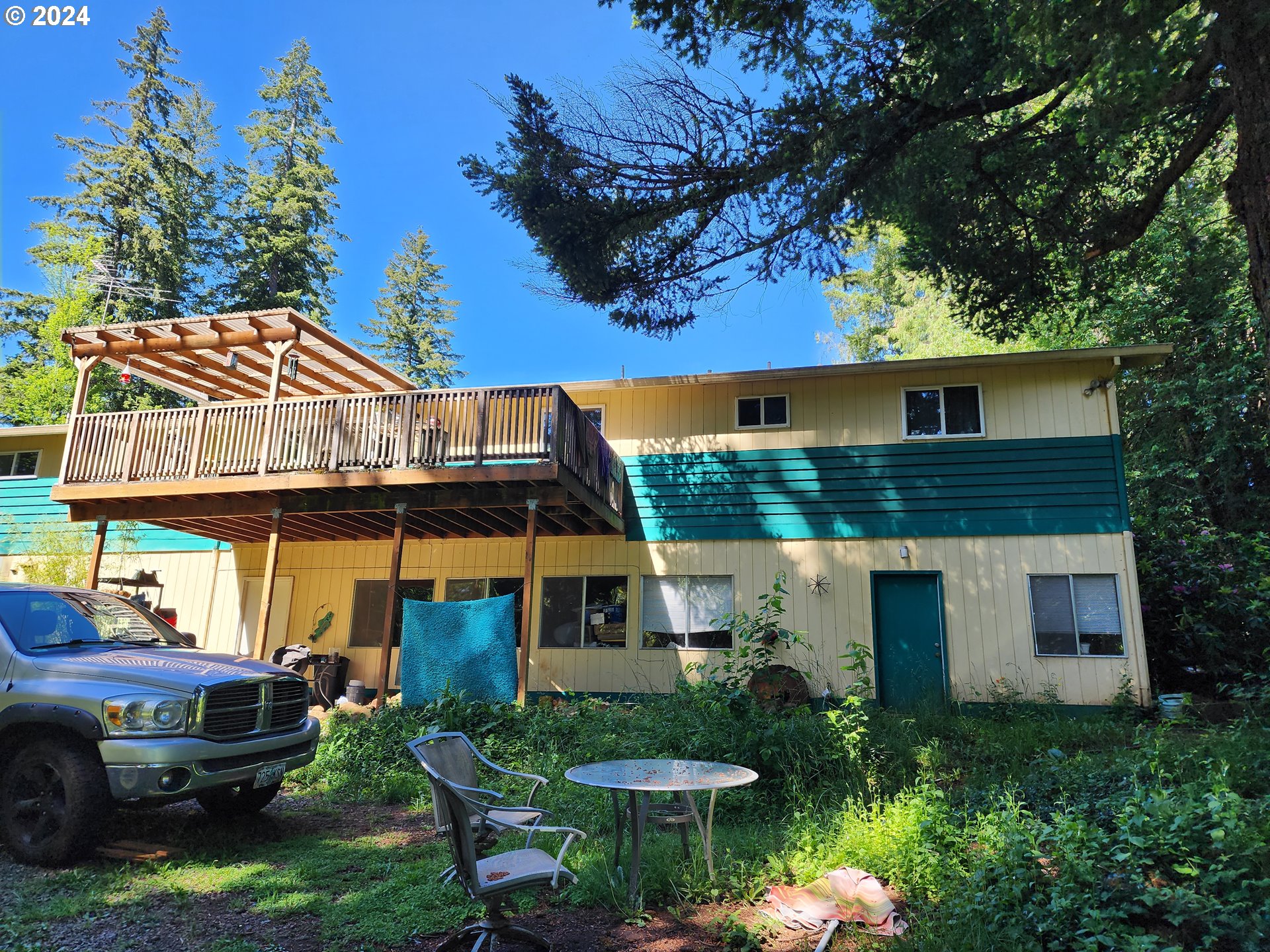 24361 South Upper Highland Road Colton, OR 97017 - Photo 11 of 47 a front view of a house with garden