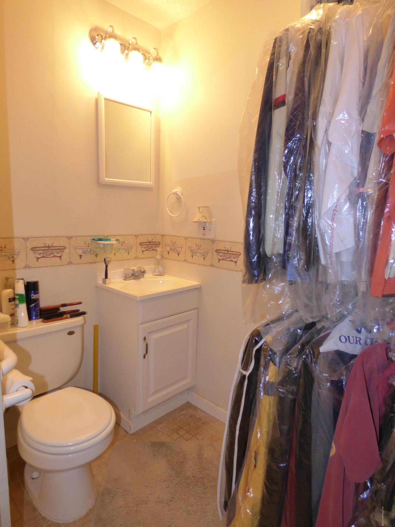 4318 Buck Point Road Jacksonville, FL 32210 - Photo 14 of 22 Half Bath off bedroom 3
