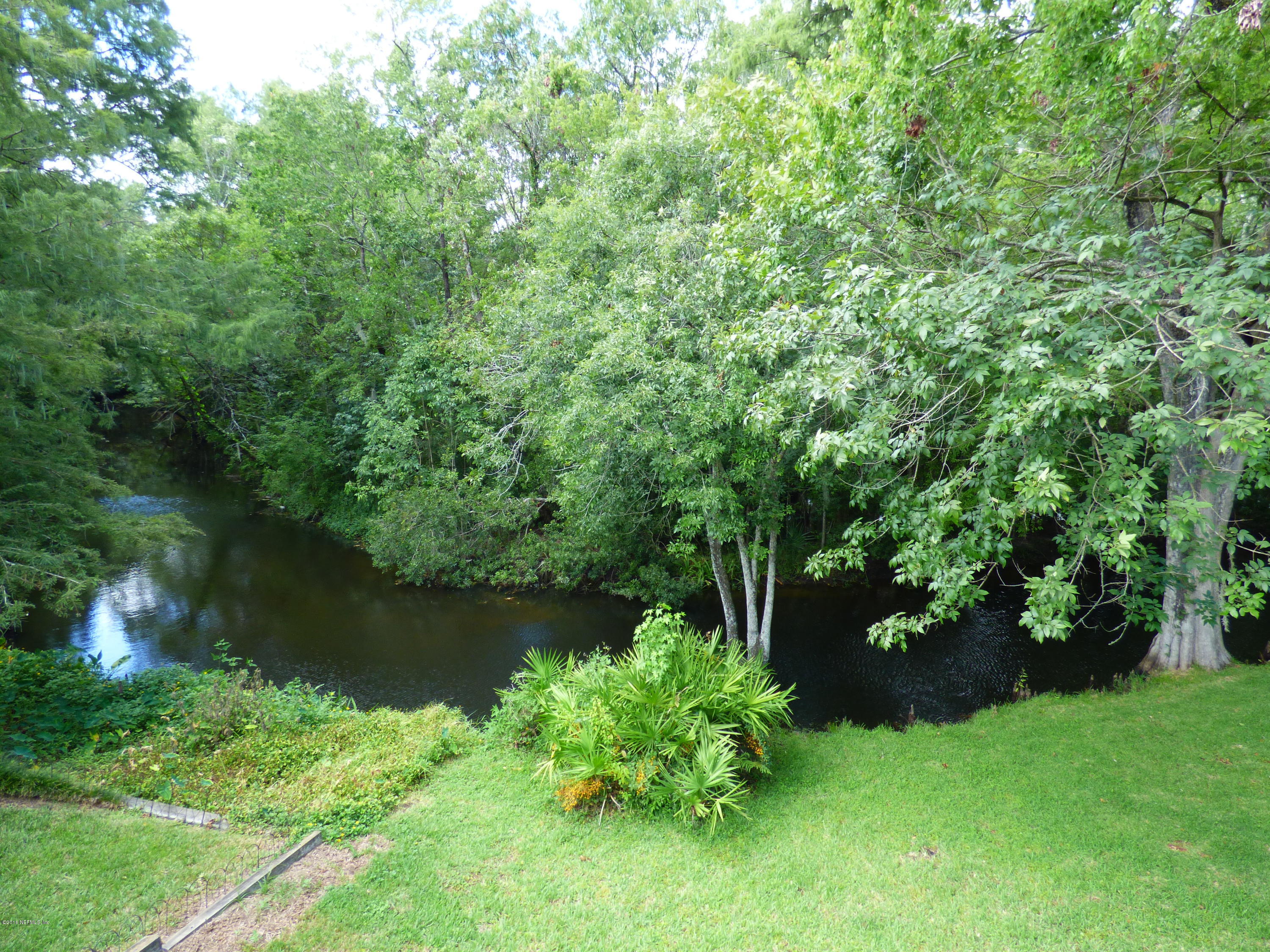 4318 Buck Point Road Jacksonville, FL 32210 - Photo 20 of 22 Canal View of back yard