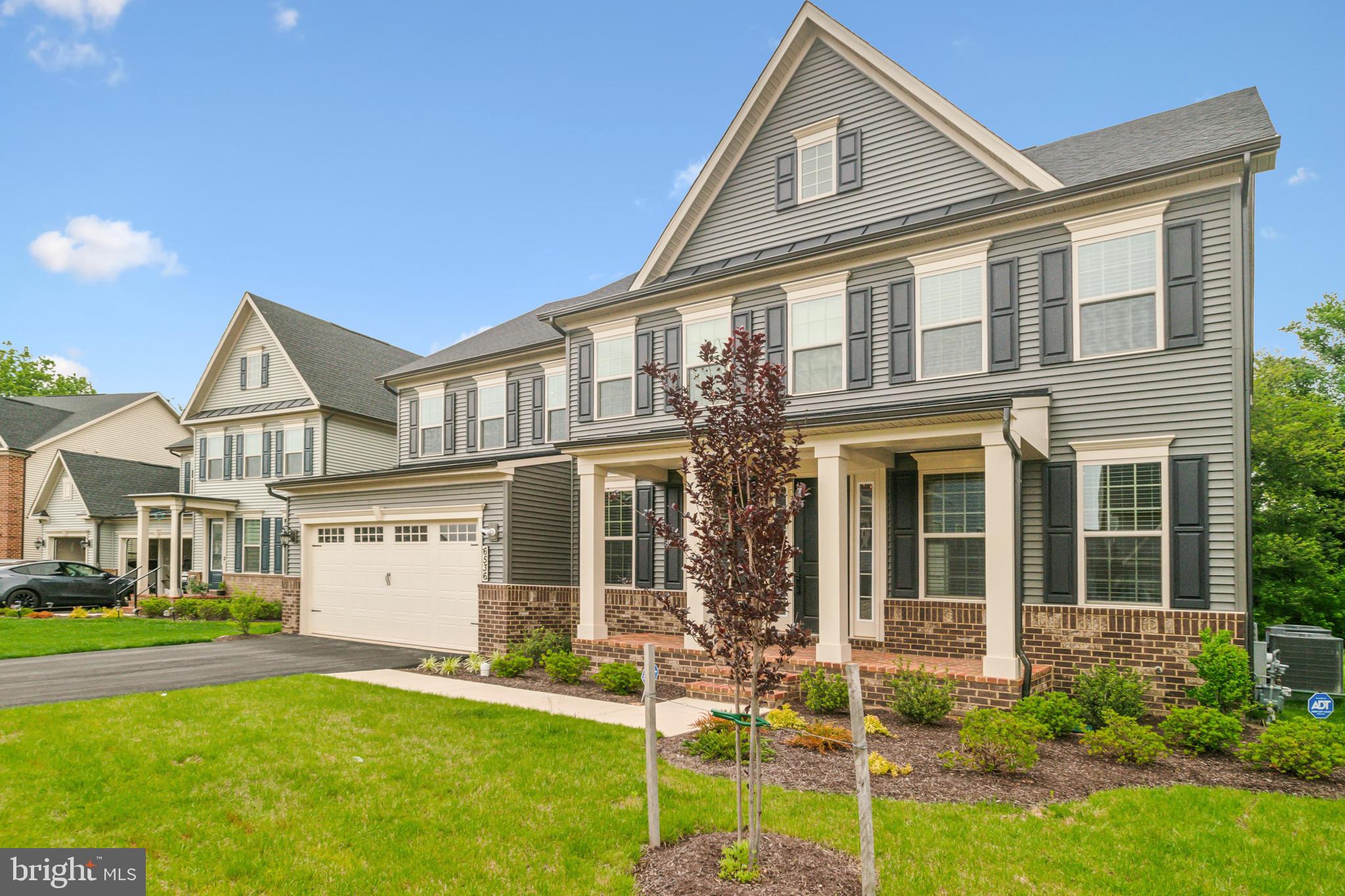 6536 Clubhouse Drive Laurel, MD 20708 - Photo 2 of 40 front view of a house with a yard