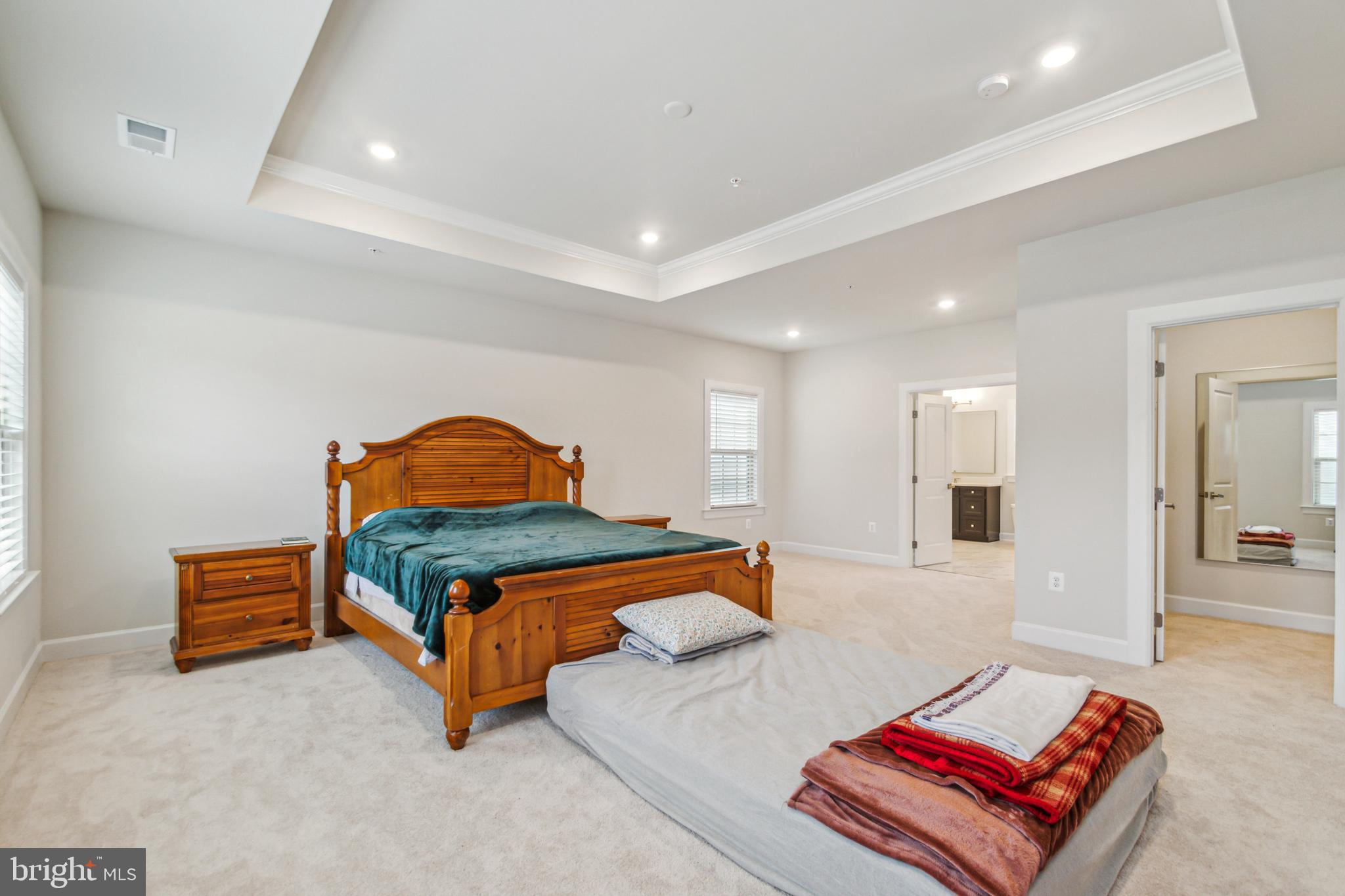 6536 Clubhouse Drive Laurel, MD 20708 - Photo 29 of 40 a bedroom with furniture and a lamp