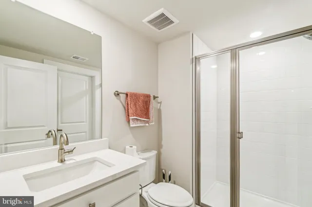 a house view with a sitting space and garden