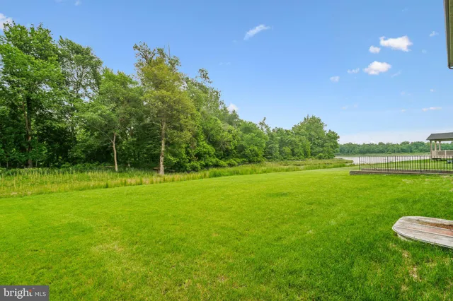 a view of a backyard of the house