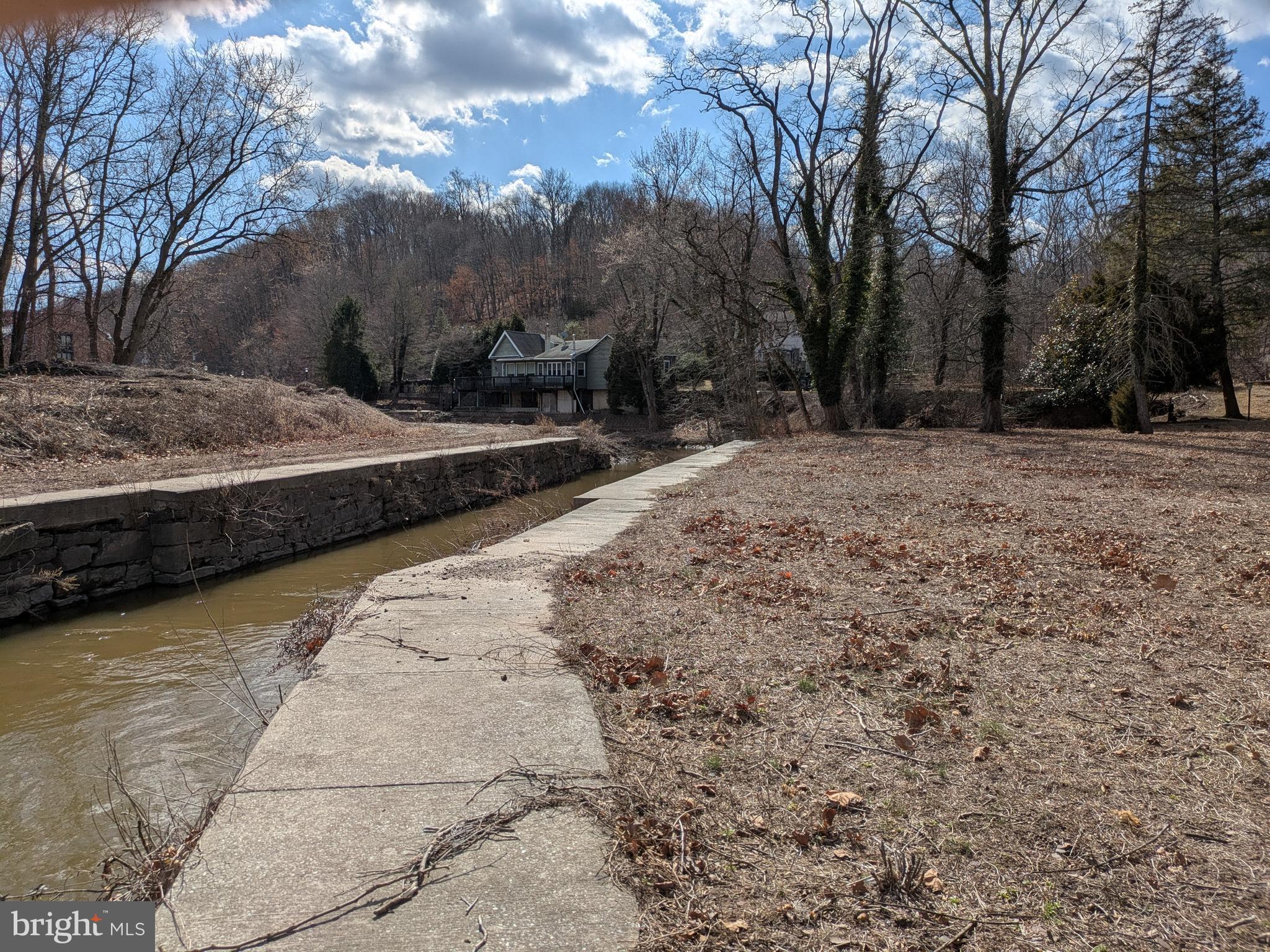 218 Towpath Street New Hope, PA 18938 - Photo 9 of 9 a view of a yard with wooden fence