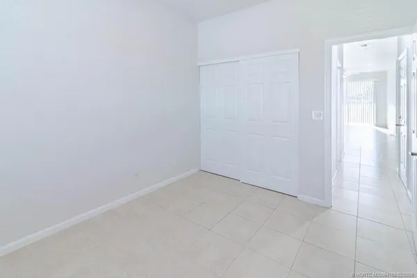 a bathroom with a sink vanity and a mirror
