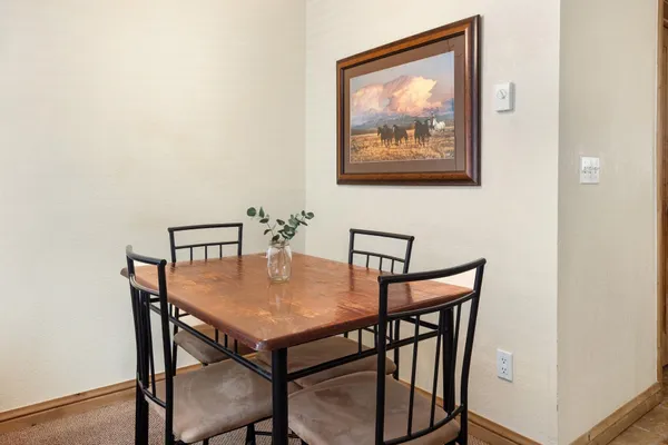 a view of a dining room with furniture