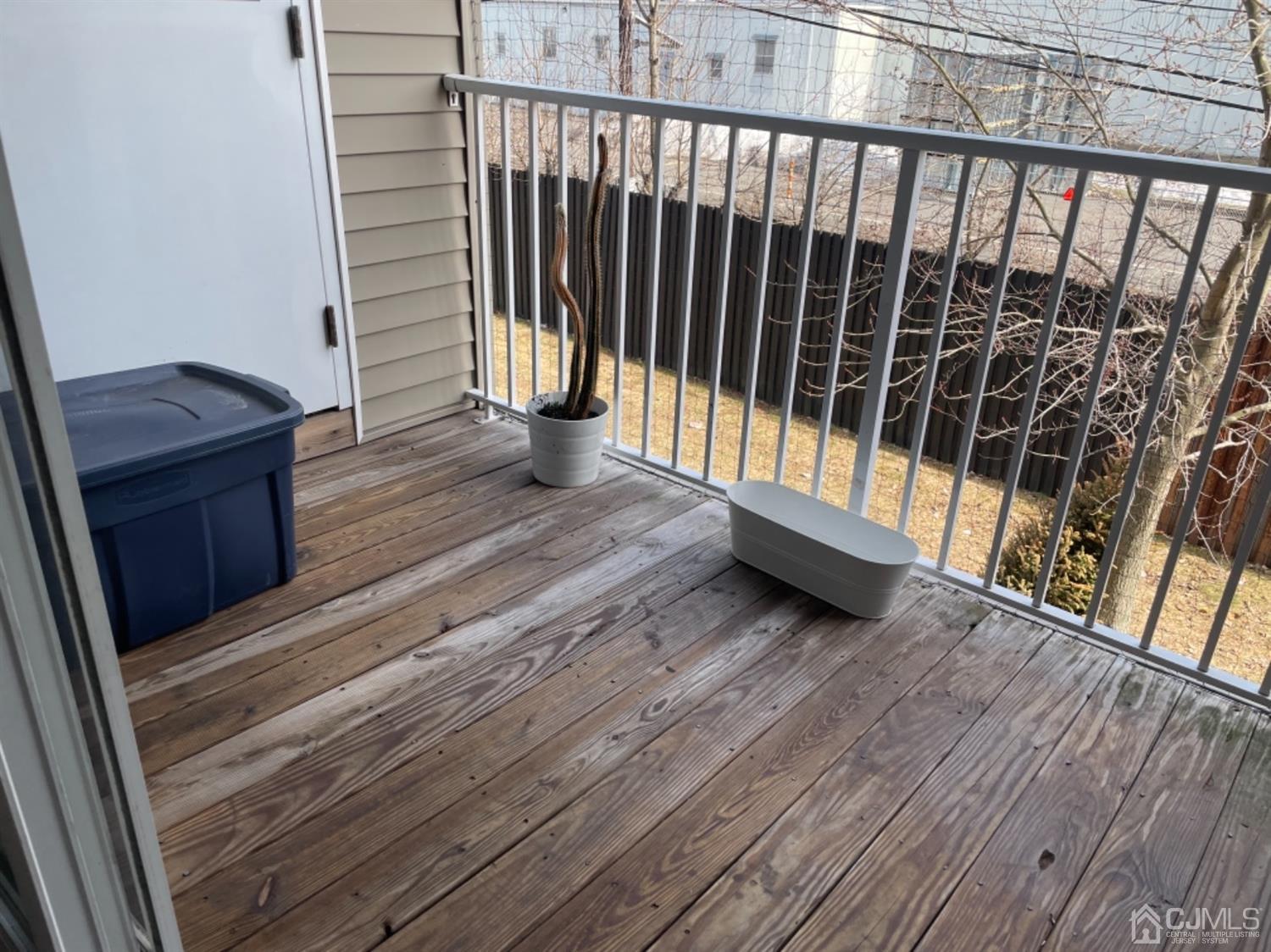 1124 Edpas Road New Brunswick, NJ 08901 - Photo 18 of 24 a view of balcony with wooden floor
