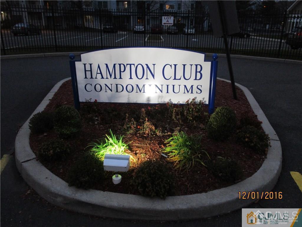 1124 Edpas Road New Brunswick, NJ 08901 - Photo 20 of 24 a sign that is sitting on a wooden table