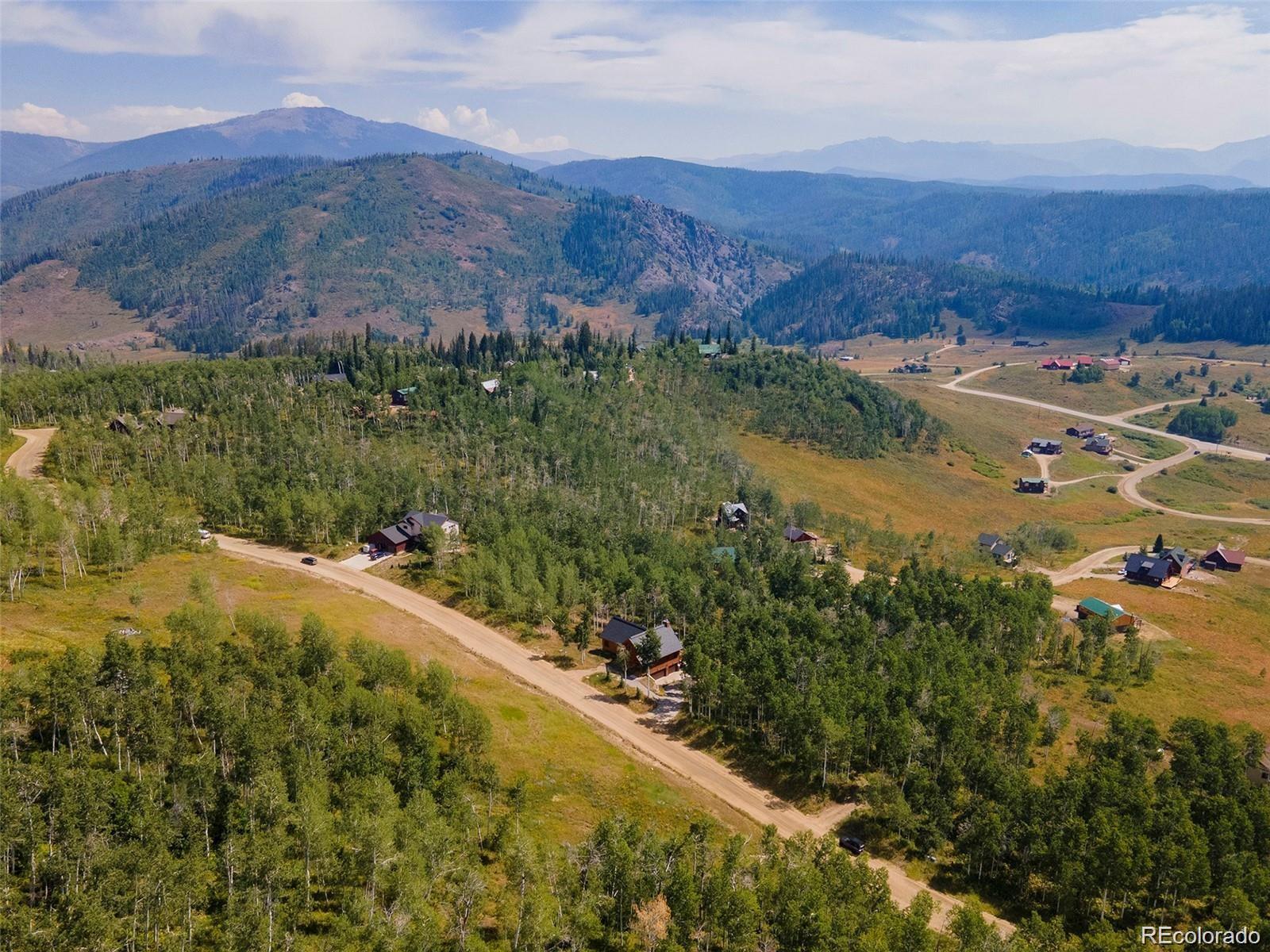 57615 Longfellow Way Clark, CO 80428 - Photo 5 of 20 a view of a lake with mountains in the background