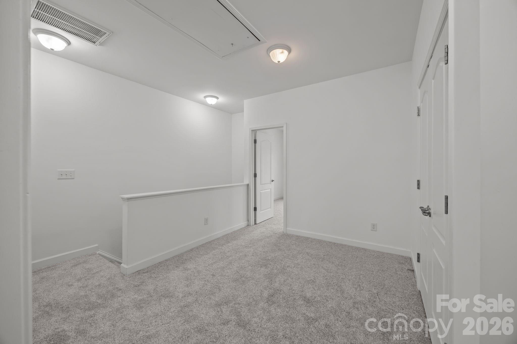 11422 Potters Row Cornelius, NC 28031 - Photo 24 of 46 a view of an empty room