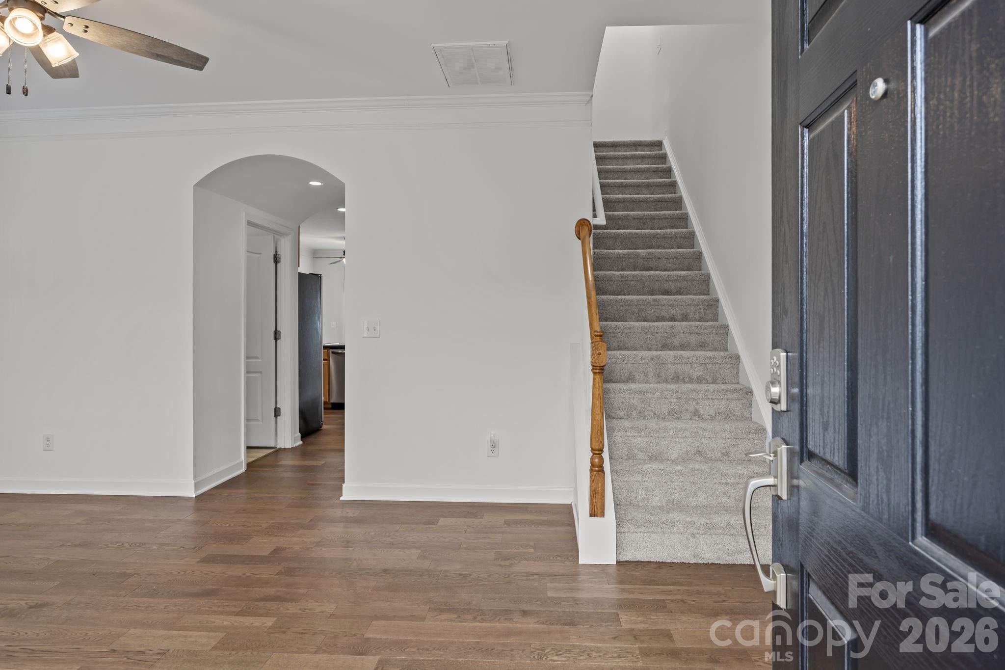 11422 Potters Row Cornelius, NC 28031 - Photo 5 of 46 a view of an entryway with stairs