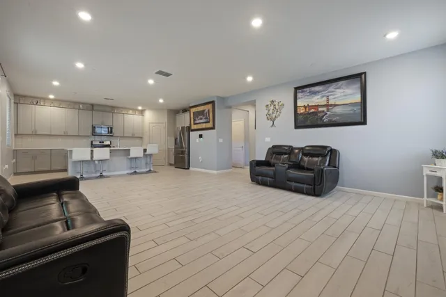 a kitchen with a sink cabinets and window