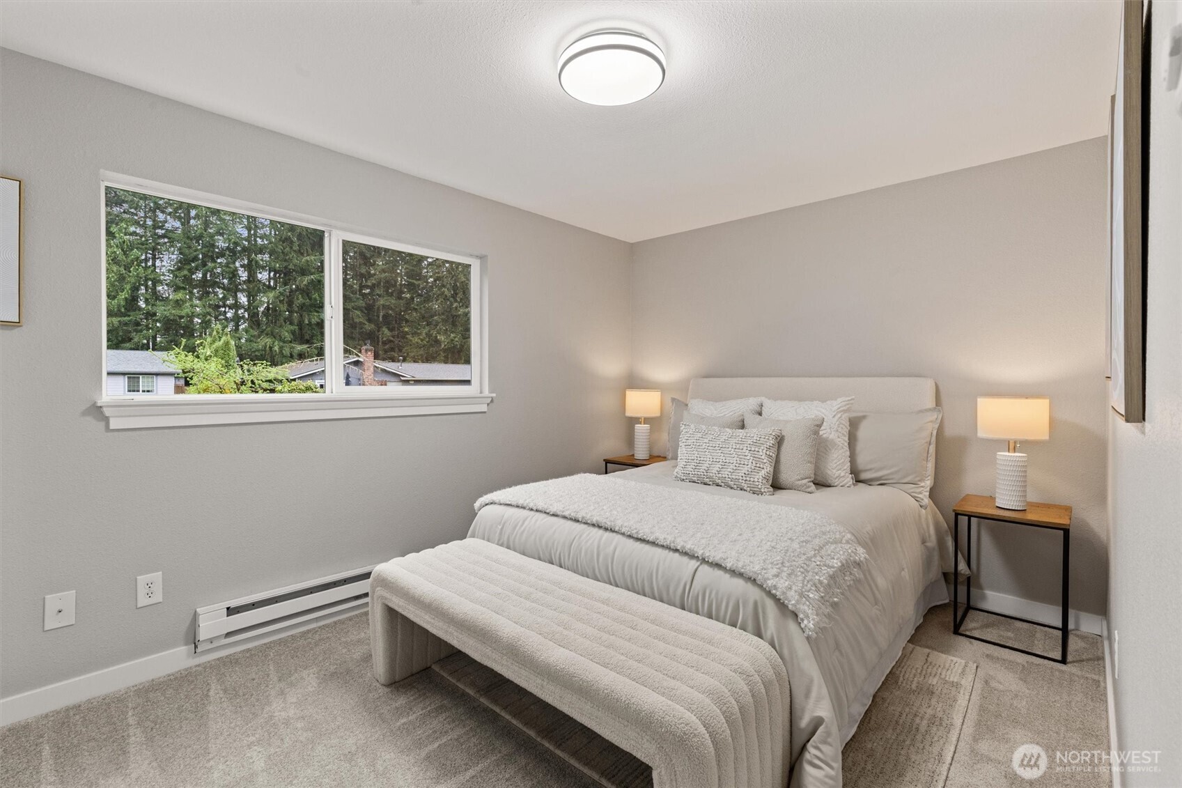 2317 164th Place Southeast Bothell, WA 98012 - Photo 16 of 32 a bedroom with a bed and a window