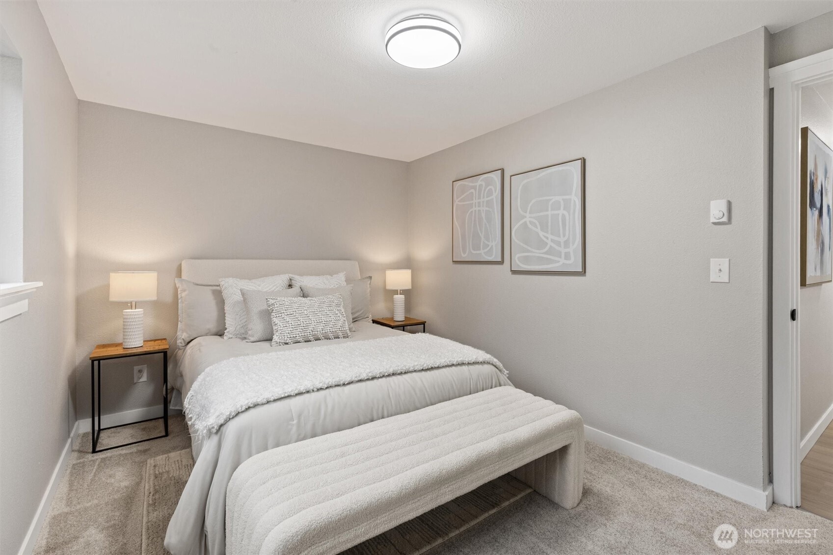 2317 164th Place Southeast Bothell, WA 98012 - Photo 17 of 32 a bedroom with a bed and a window