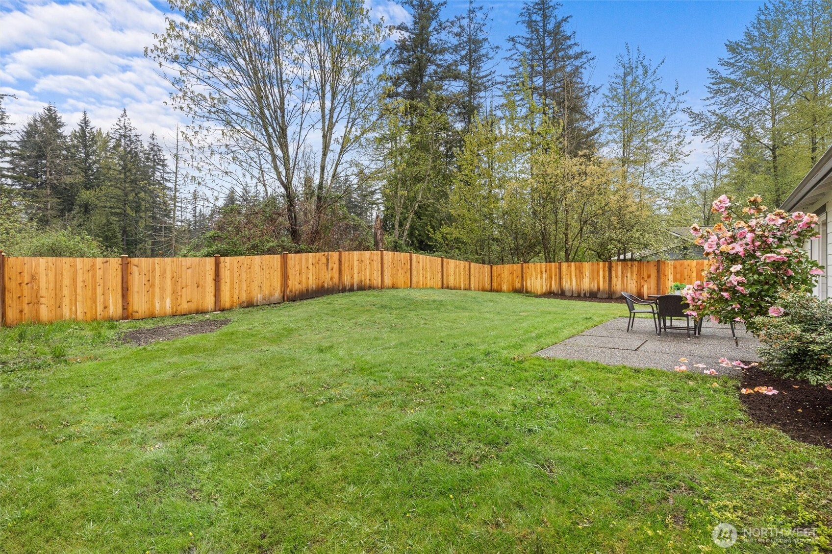 2317 164th Place Southeast Bothell, WA 98012 - Photo 29 of 32 a view of backyard with swimming pool and green space