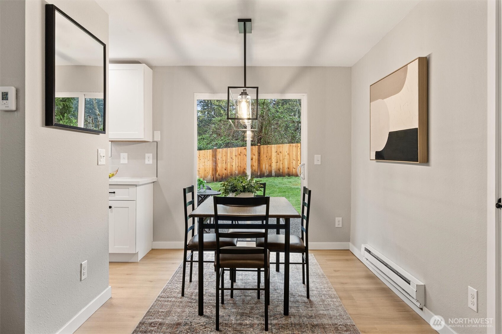 2317 164th Place Southeast Bothell, WA 98012 - Photo 10 of 32 a dining room with furniture and window
