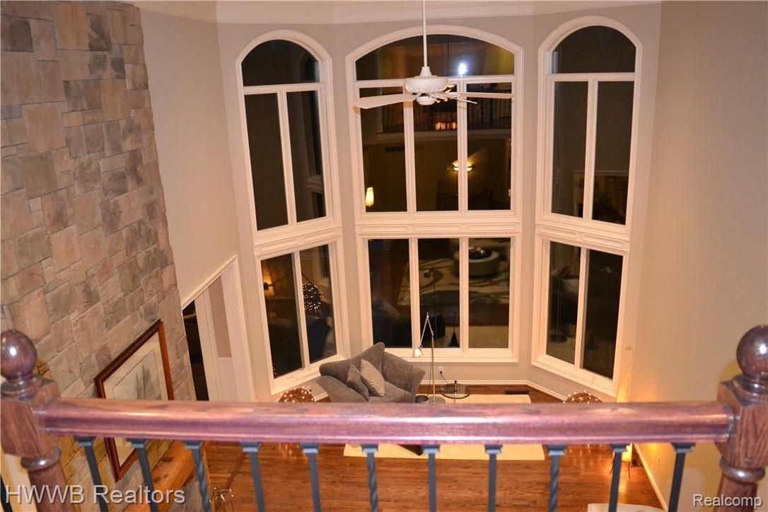 5590 Leeds Court Rochester, MI 48306 - Photo 52 of 73 Wall to ceiling windows in Great Room