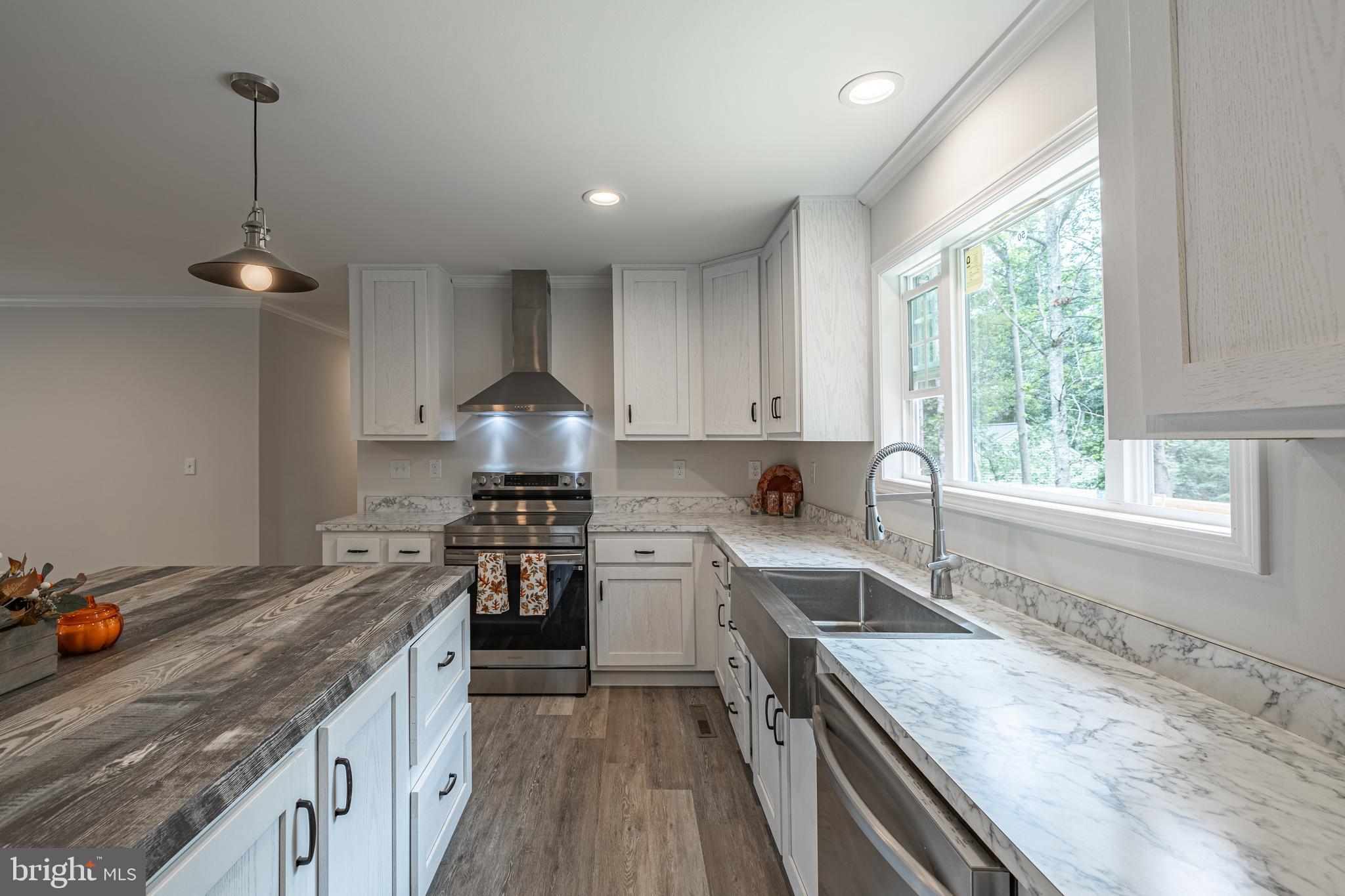 307 Larkspur Road Ruckersville, VA 22968 - Photo 4 of 72 Bathe in natural light in the ergonomic kitchen!