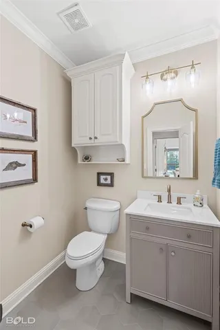 a kitchen with granite countertop a stove and a refrigerator