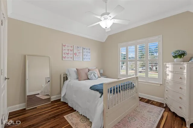 a spacious bathroom with a double vanity sink a mirror and a bathtub