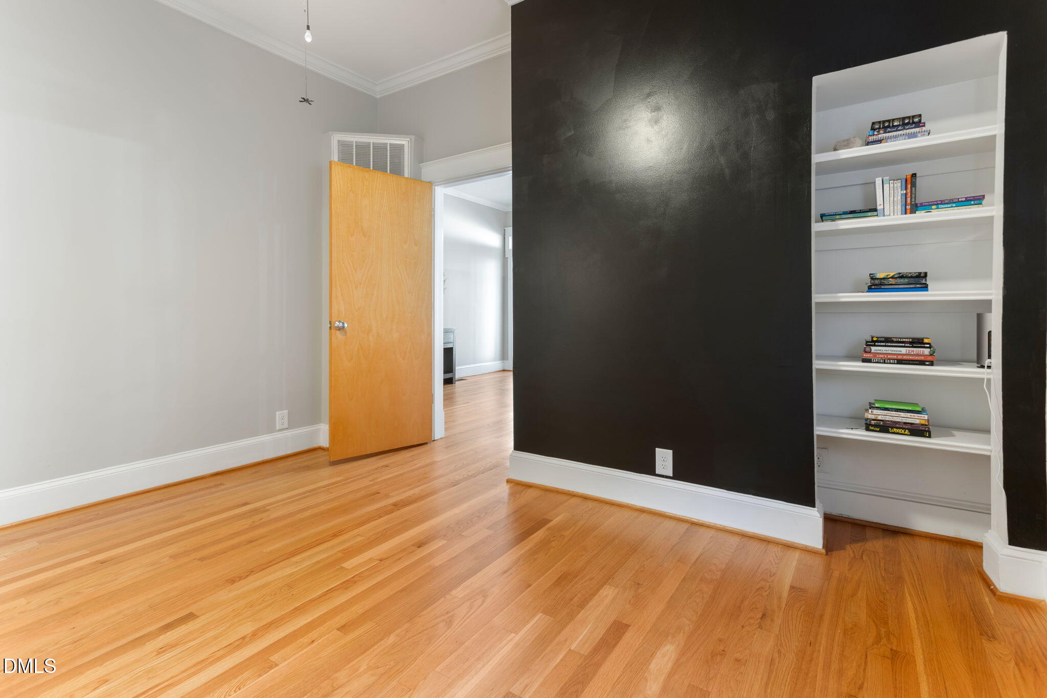 709 West North Street Raleigh, NC 27603 - Photo 14 of 42 a view of an empty room with closet and a window