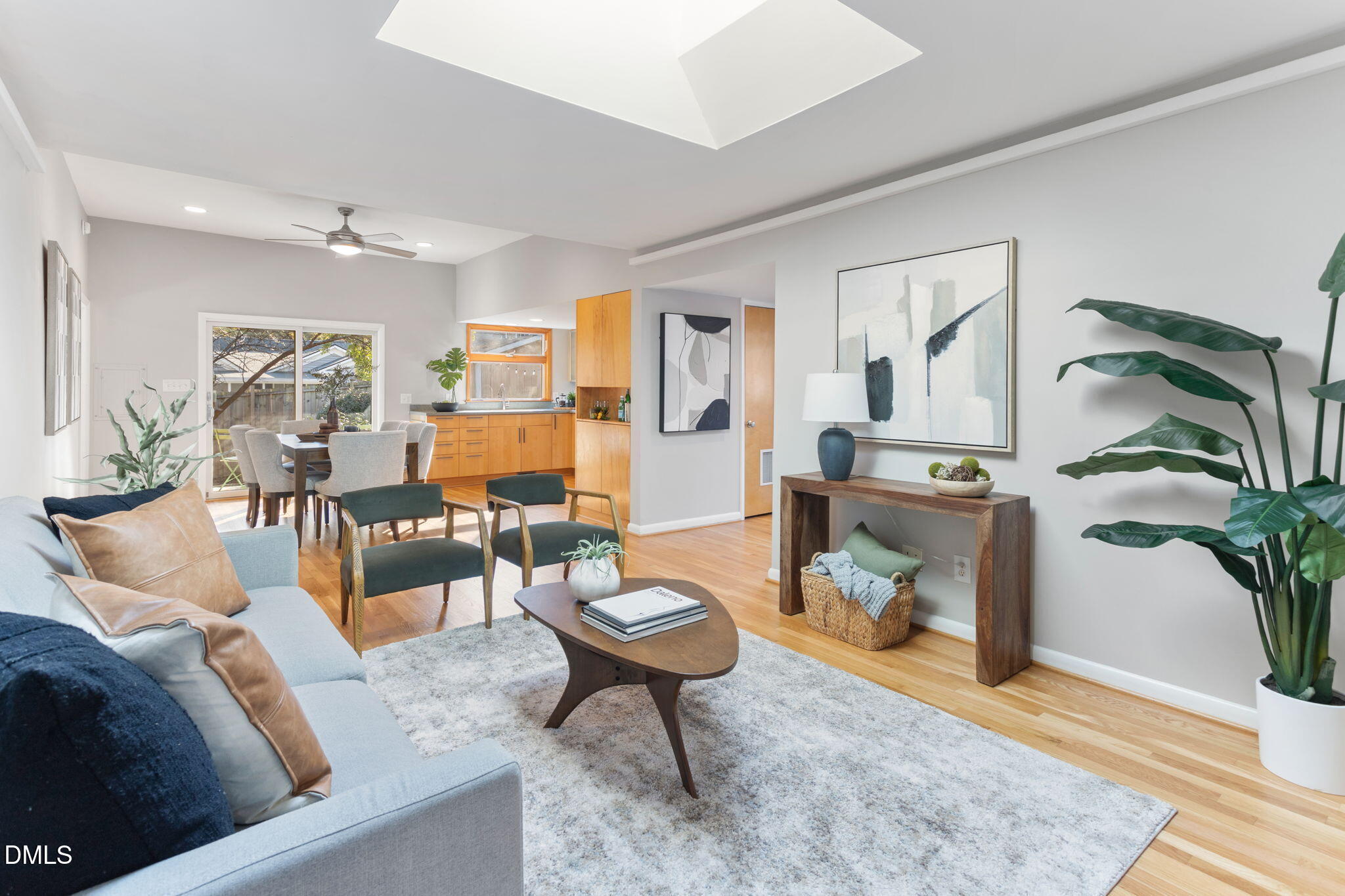 709 West North Street Raleigh, NC 27603 - Photo 15 of 42 a living room with furniture potted plant and a table