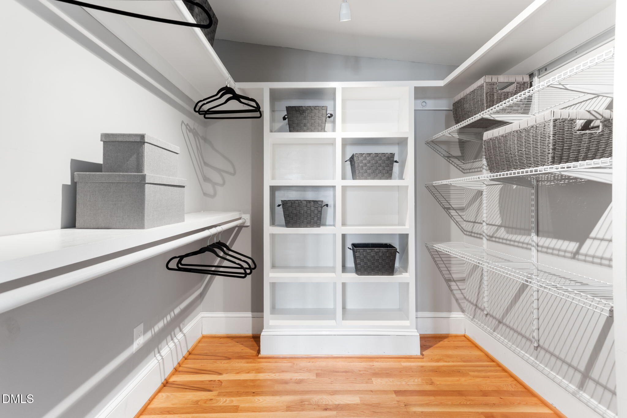 709 West North Street Raleigh, NC 27603 - Photo 18 of 42 a view of an empty room with wooden floor and windows