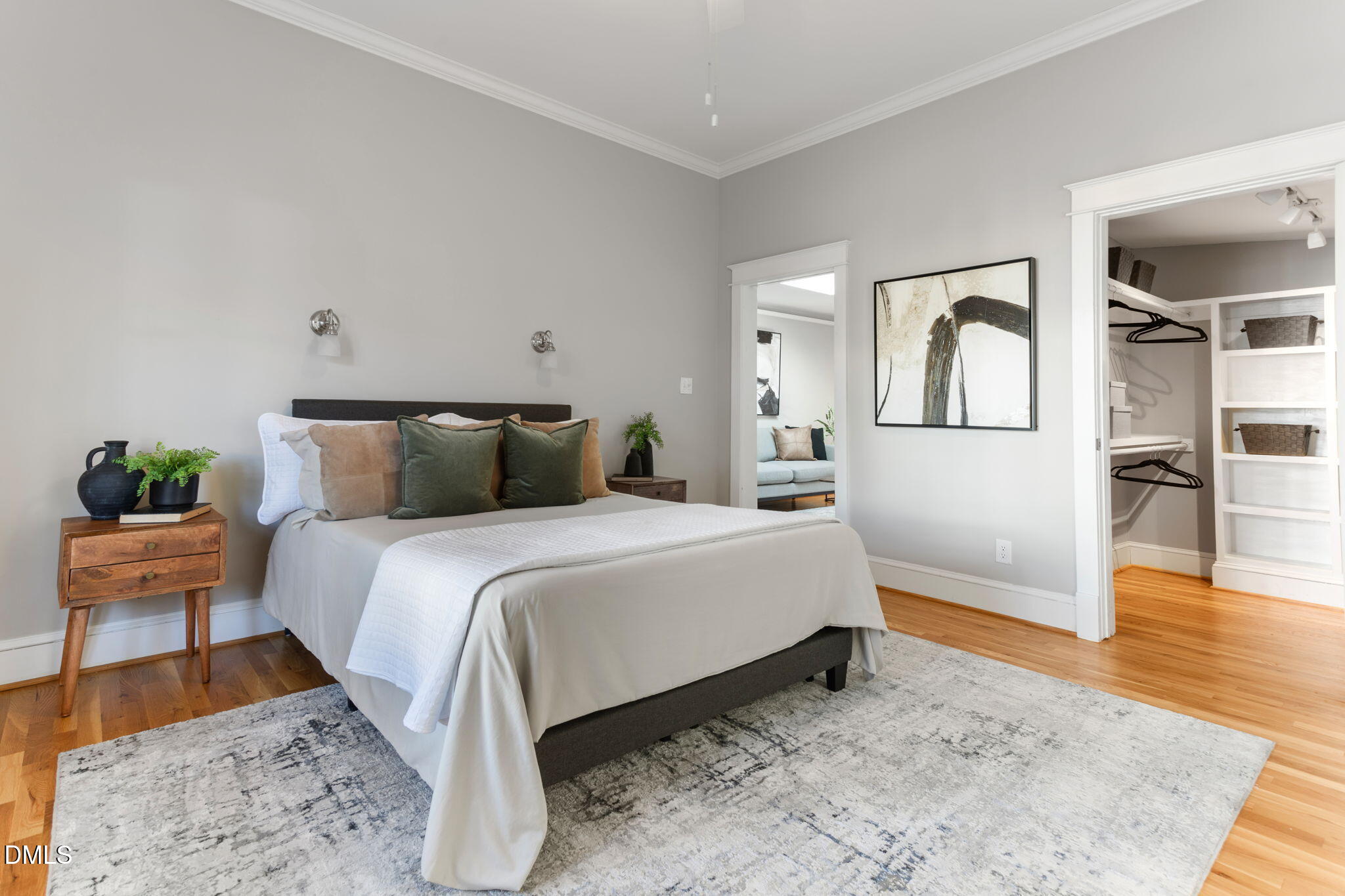 709 West North Street Raleigh, NC 27603 - Photo 19 of 42 a bedroom with a bed and wooden floor