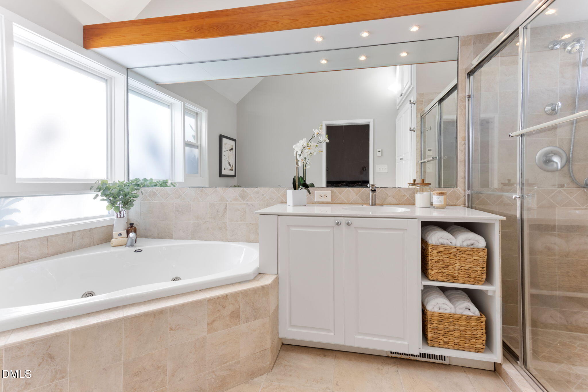 709 West North Street Raleigh, NC 27603 - Photo 21 of 42 a bathroom with a tub sink and mirror